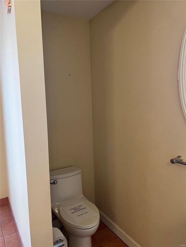 bathroom featuring tile flooring