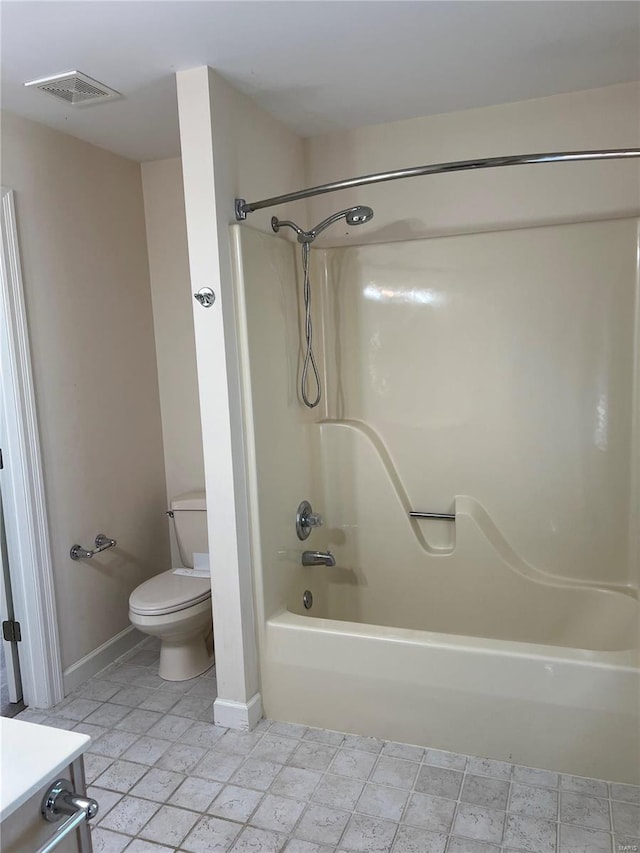 full bathroom with toilet, vanity, tile floors, and bathing tub / shower combination