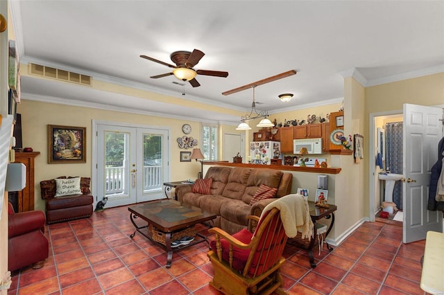 tiled living room with crown molding and ceiling fan