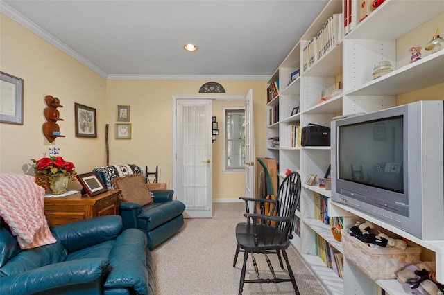 carpeted living room featuring french doors and ornamental molding