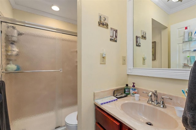 bathroom with crown molding, vanity, toilet, and walk in shower