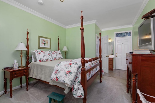 carpeted bedroom featuring crown molding