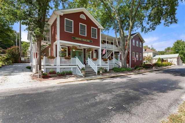 view of front of property featuring covered porch