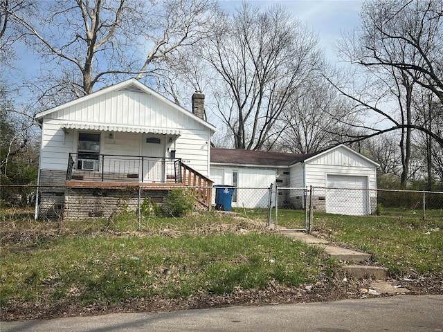 view of front of house with a porch and a garage