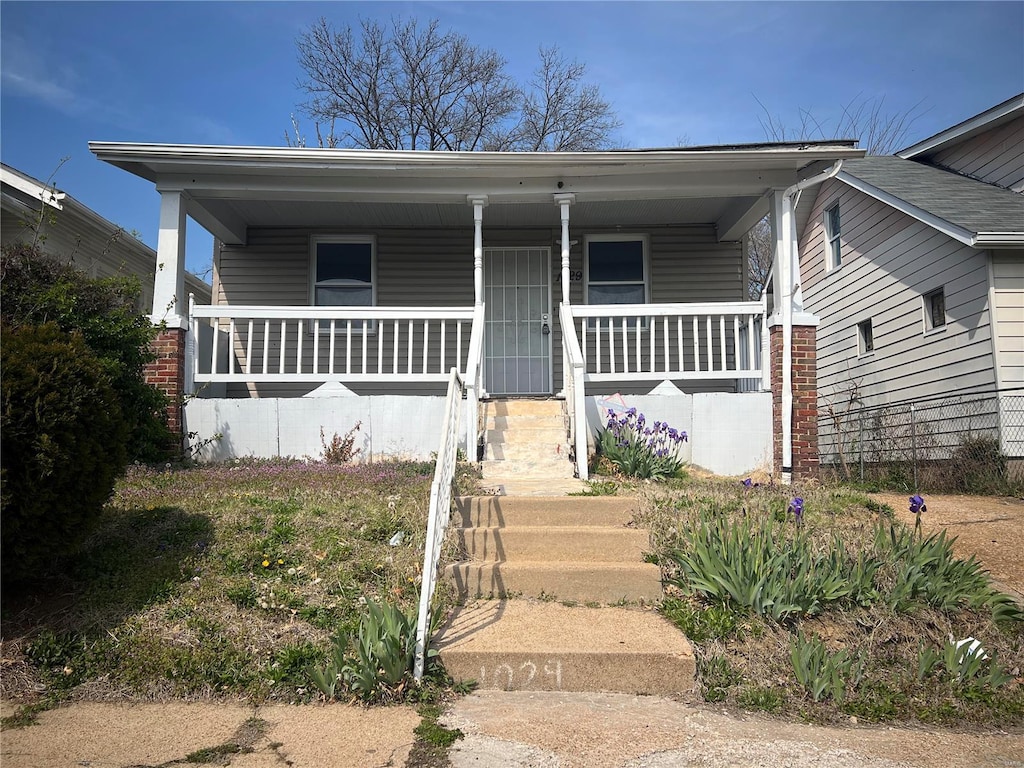 view of front of house with covered porch