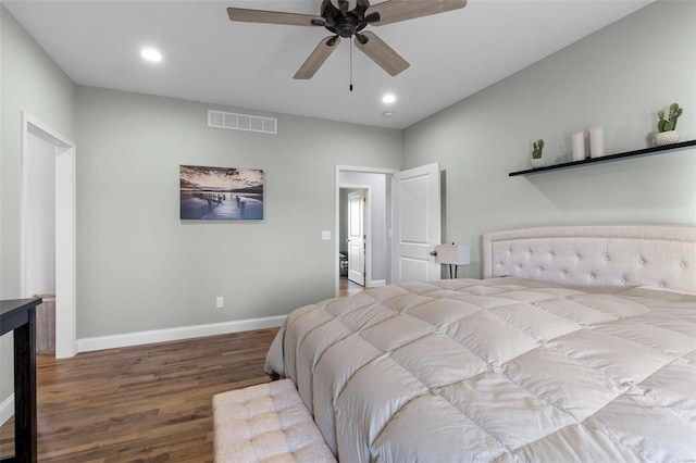 bedroom with light hardwood / wood-style floors and ceiling fan