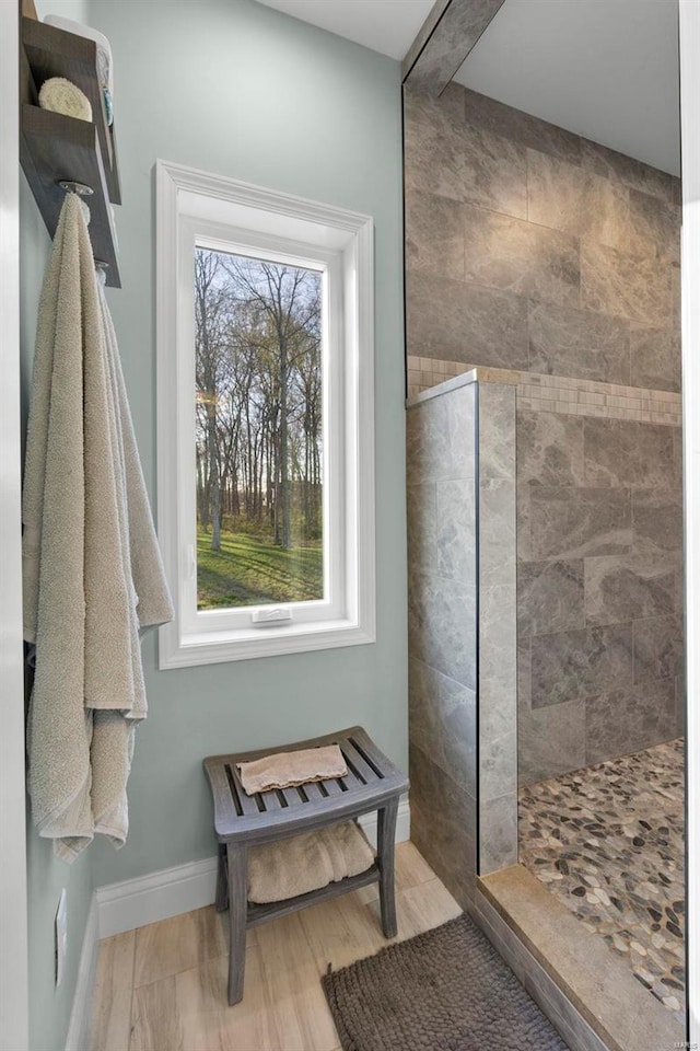 bathroom with plenty of natural light and tile flooring