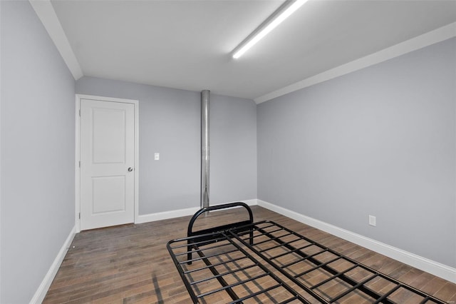 spare room with dark hardwood / wood-style floors