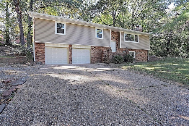 bi-level home featuring a garage