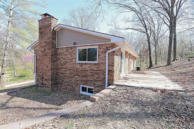 view of home's exterior with a patio