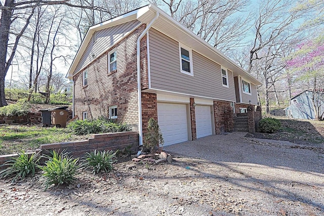 view of home's exterior with a garage