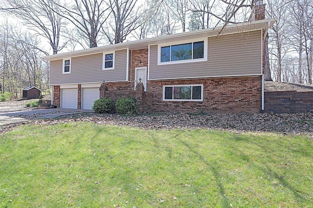 raised ranch featuring a front yard and a garage