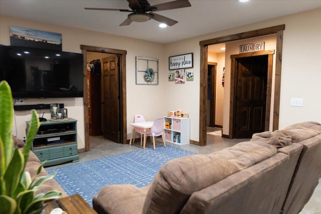 living room with light colored carpet and ceiling fan