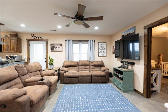 living room with ceiling fan