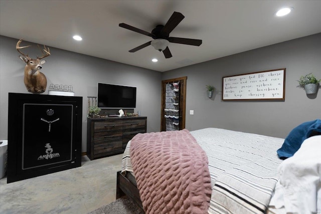 bedroom featuring light carpet and ceiling fan