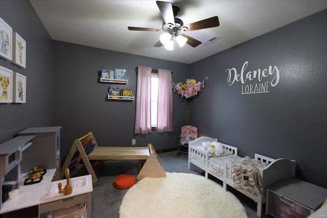 carpeted bedroom featuring ceiling fan