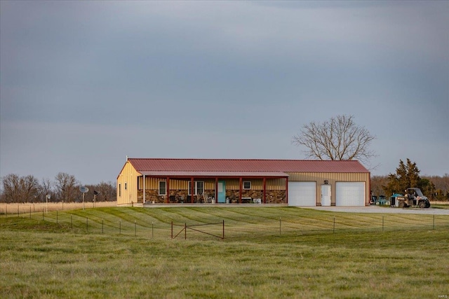 ranch-style home featuring a front yard