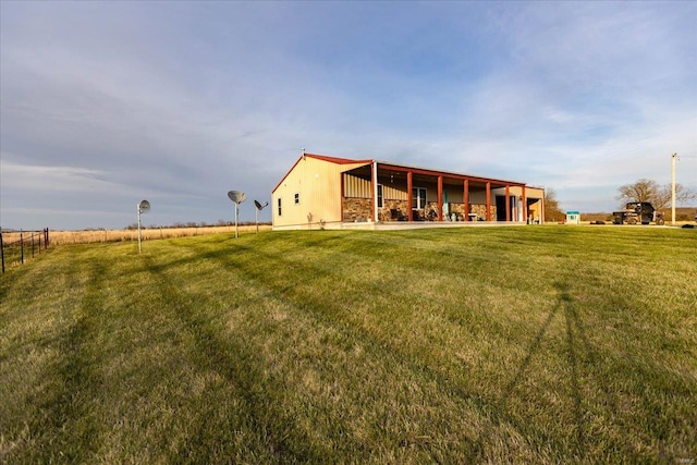 back of house featuring a yard