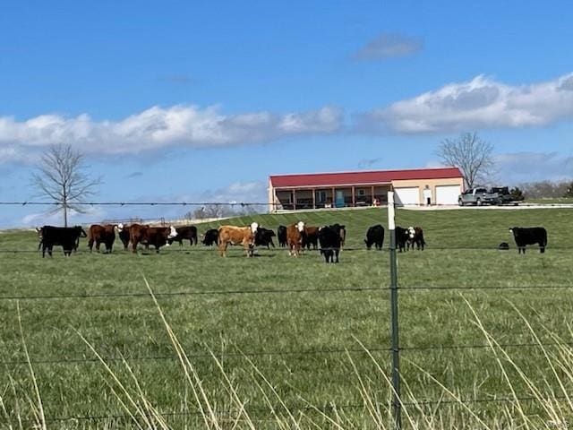 view of nearby features with a rural view