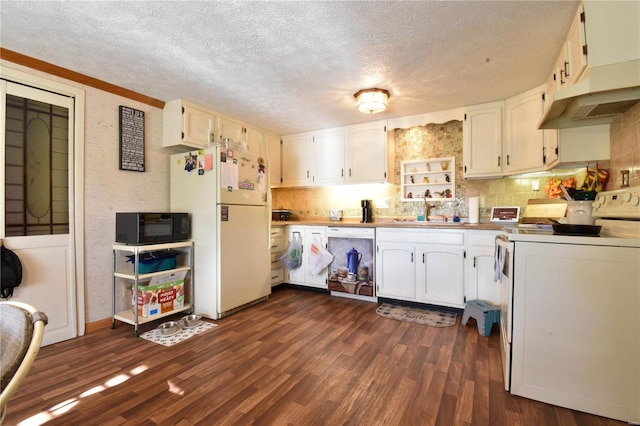 kitchen with backsplash, white appliances, dark hardwood / wood-style floors, a textured ceiling, and sink