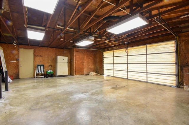 garage featuring white refrigerator