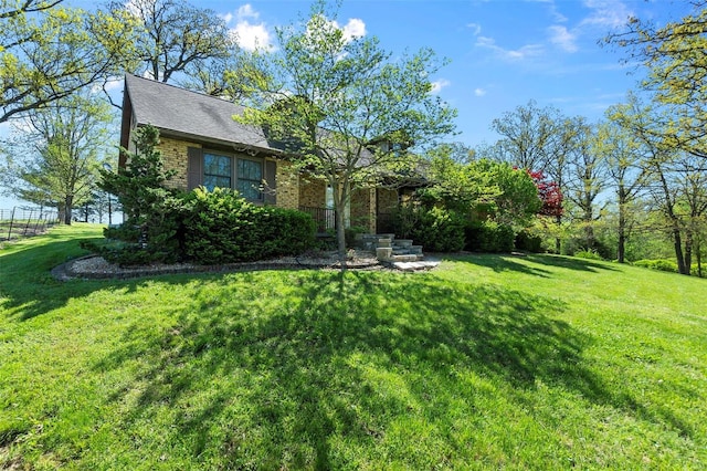 exterior space with a front yard