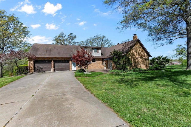 view of front of home featuring a garage and a front lawn