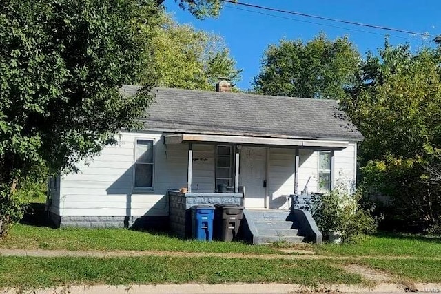 bungalow-style home featuring a porch