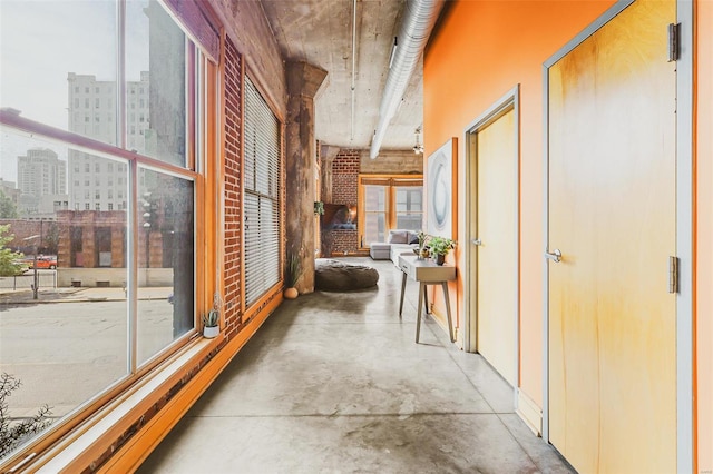 corridor featuring concrete floors