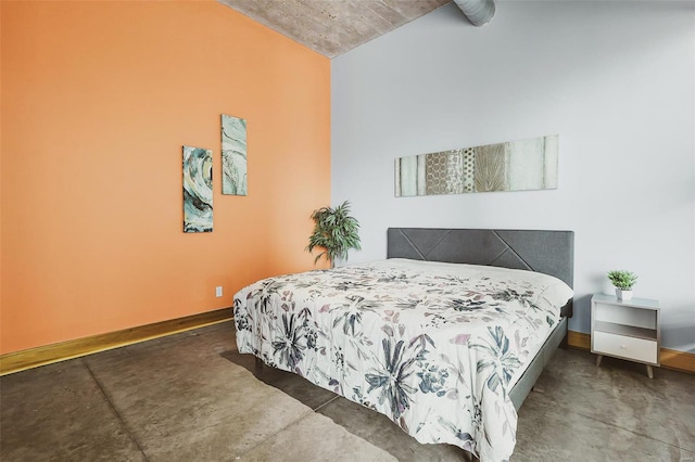 bedroom with concrete flooring