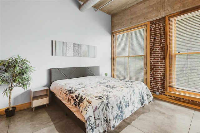 bedroom with concrete flooring