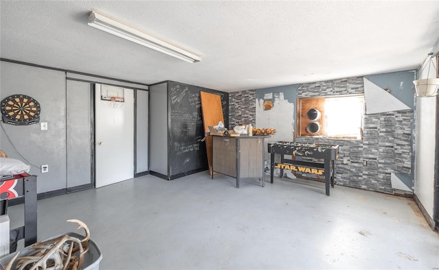 basement with a textured ceiling