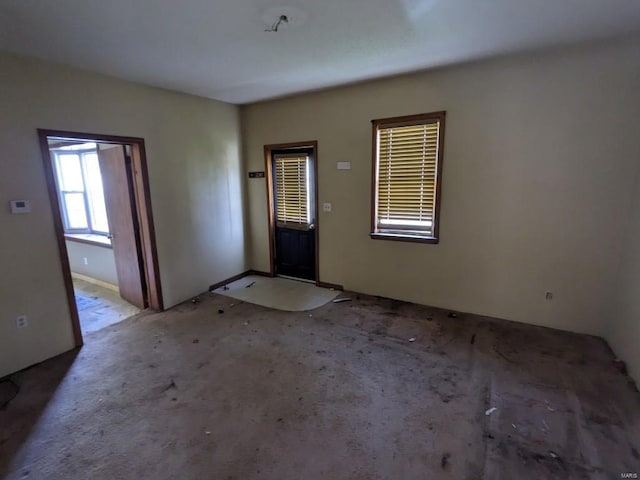 unfurnished room with carpet floors