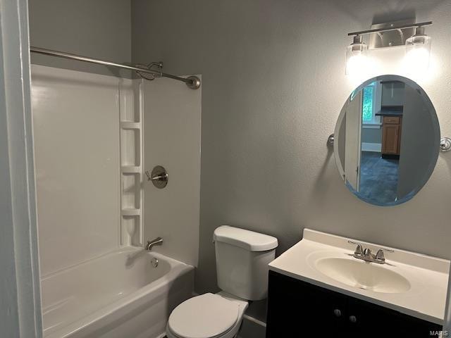 full bathroom featuring  shower combination, toilet, and vanity