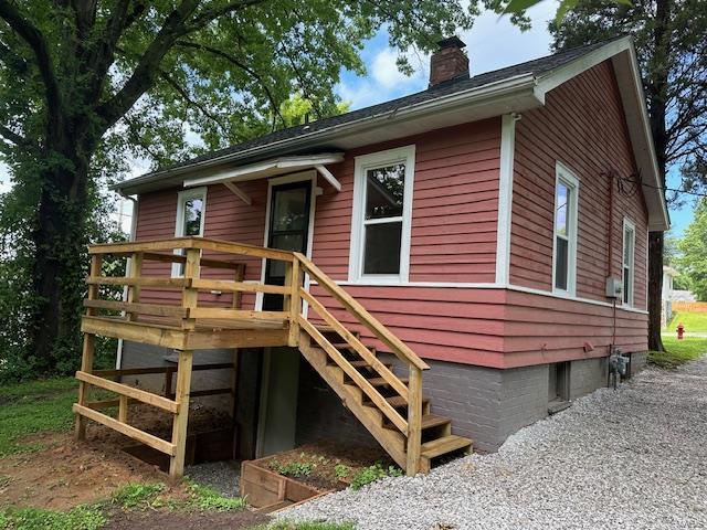 view of front of home with a deck