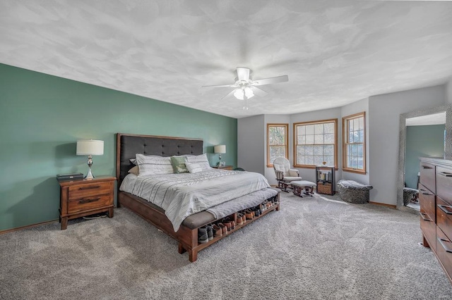 bedroom featuring ceiling fan and light colored carpet