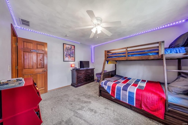 carpeted bedroom featuring ceiling fan