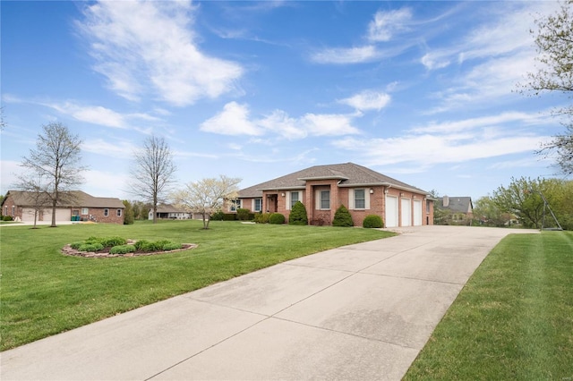 view of front of property featuring a front yard and a garage