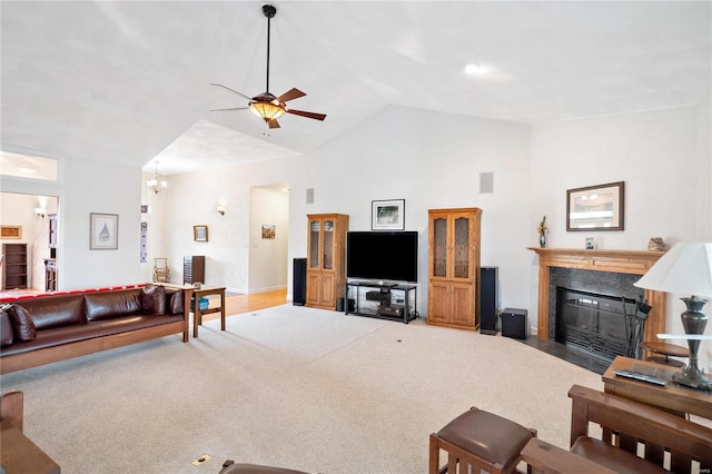 living room featuring ceiling fan, carpet flooring, and high vaulted ceiling