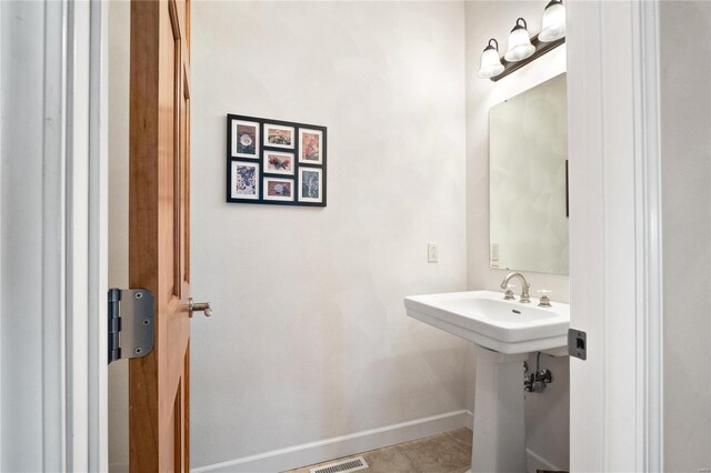 bathroom with tile floors