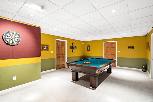 recreation room with a paneled ceiling, light carpet, and pool table