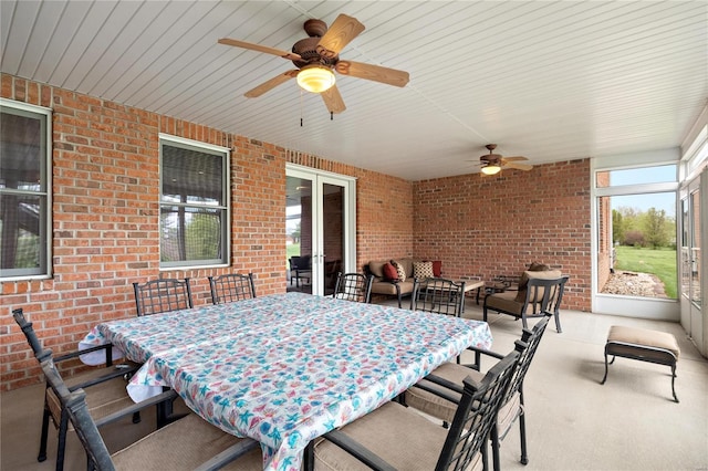 view of terrace with ceiling fan and an outdoor hangout area