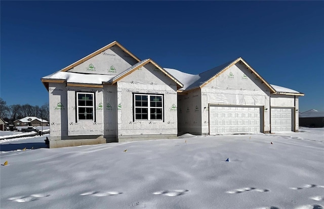 unfinished property featuring a garage