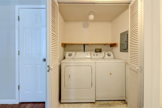 laundry room featuring independent washer and dryer, washer hookup, and hardwood / wood-style floors