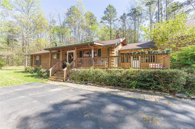 view of log-style house