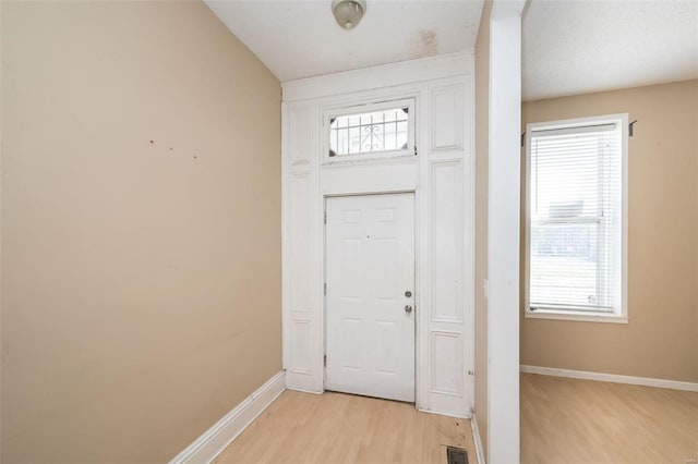 foyer entrance featuring light hardwood / wood-style flooring