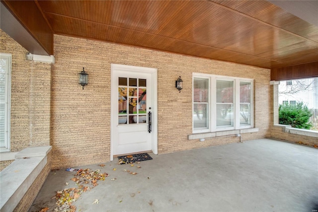 entrance to property with a patio