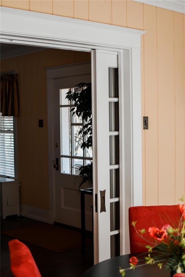 interior space featuring wooden walls