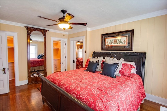 bedroom featuring crown molding, ceiling fan, and dark hardwood / wood-style flooring