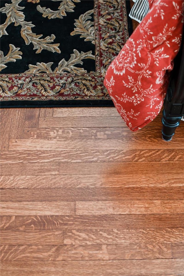 interior details featuring hardwood / wood-style floors